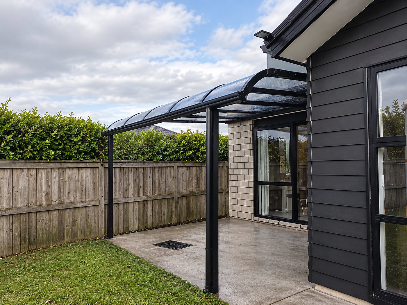 Glass pergola at sunset